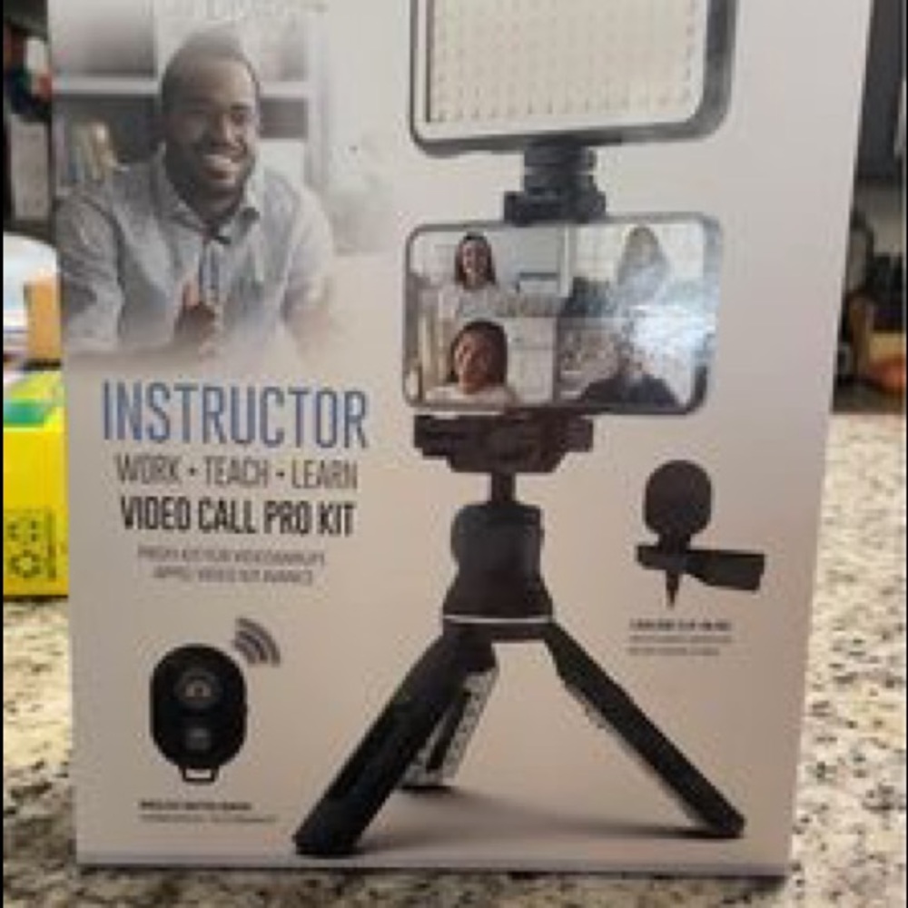 Tripod with light, microphone and Bluetooth remote brand new